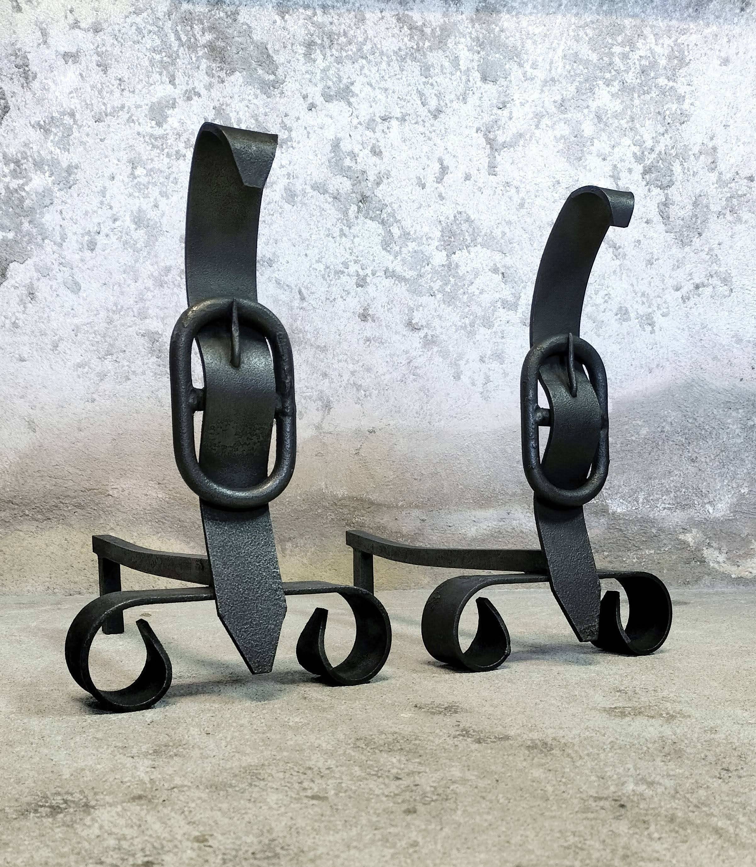 Pair of fire dogs "belt buckle"