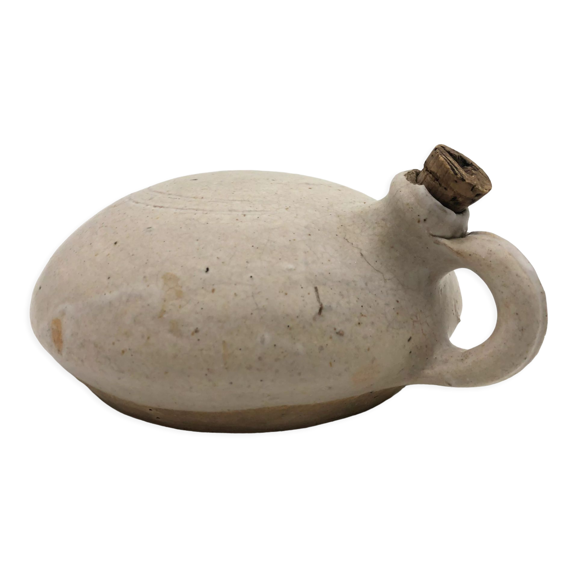 Old round sandstone hot water bottle