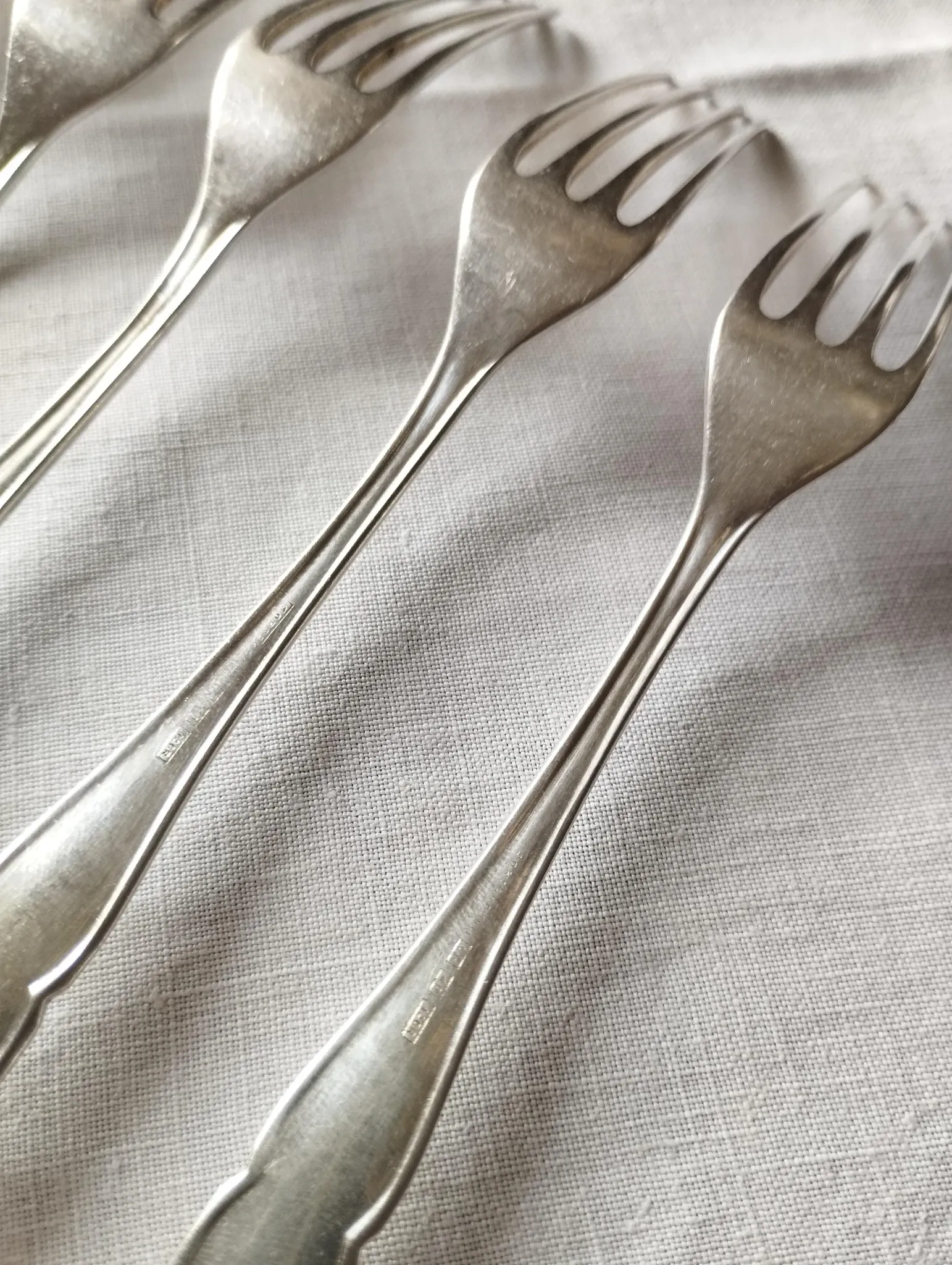 8 small numbered silver-plated forks Sorsakoski