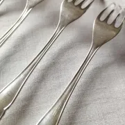 8 small numbered silver-plated forks Sorsakoski