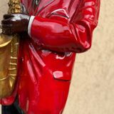 Large black and red jazz figurine in fibreglass, decorative sculpture from the 1960s.