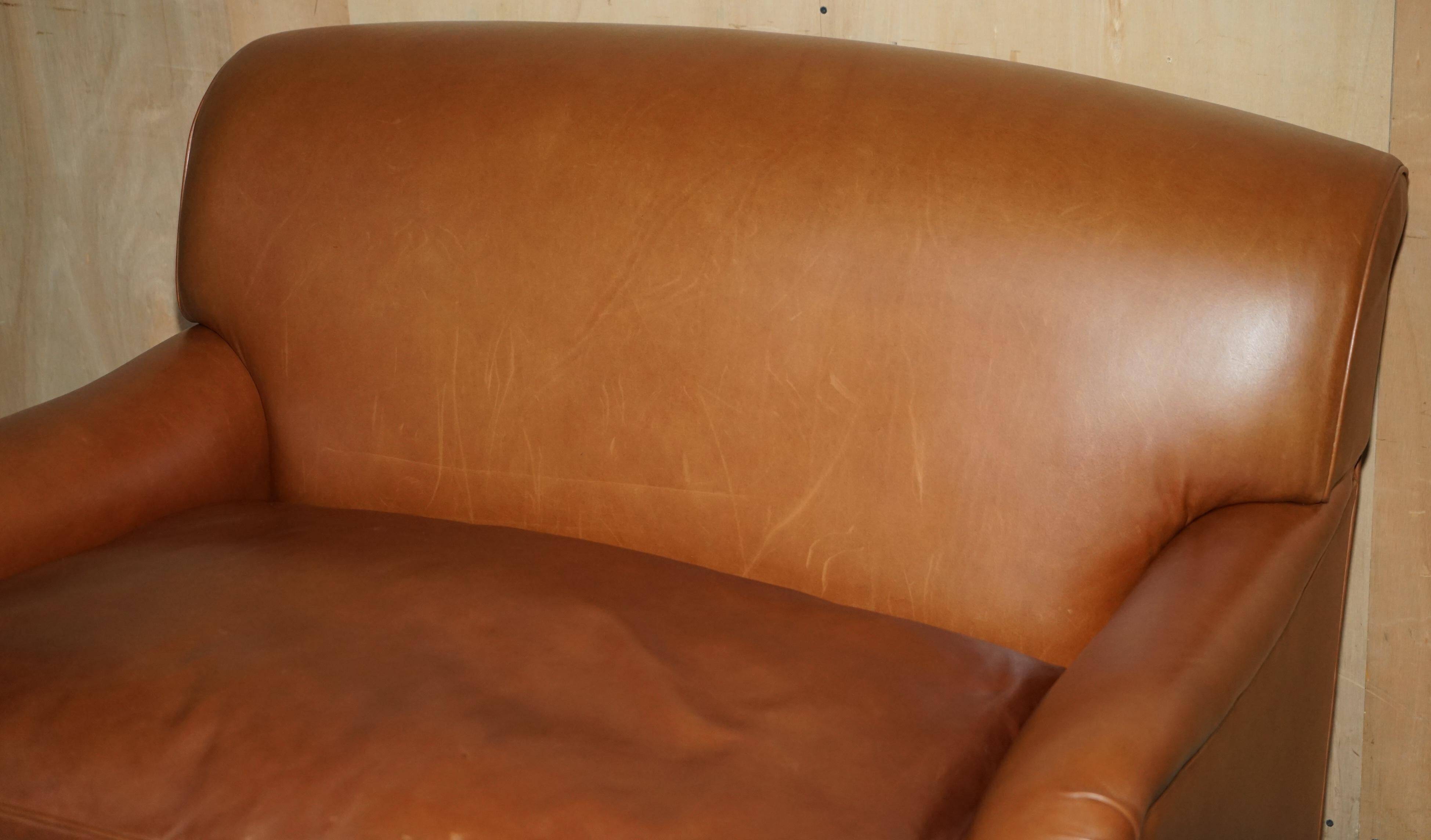 Two-seater leather armchair in Howard style by George Smith.