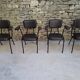 Brown faux leather armchairs