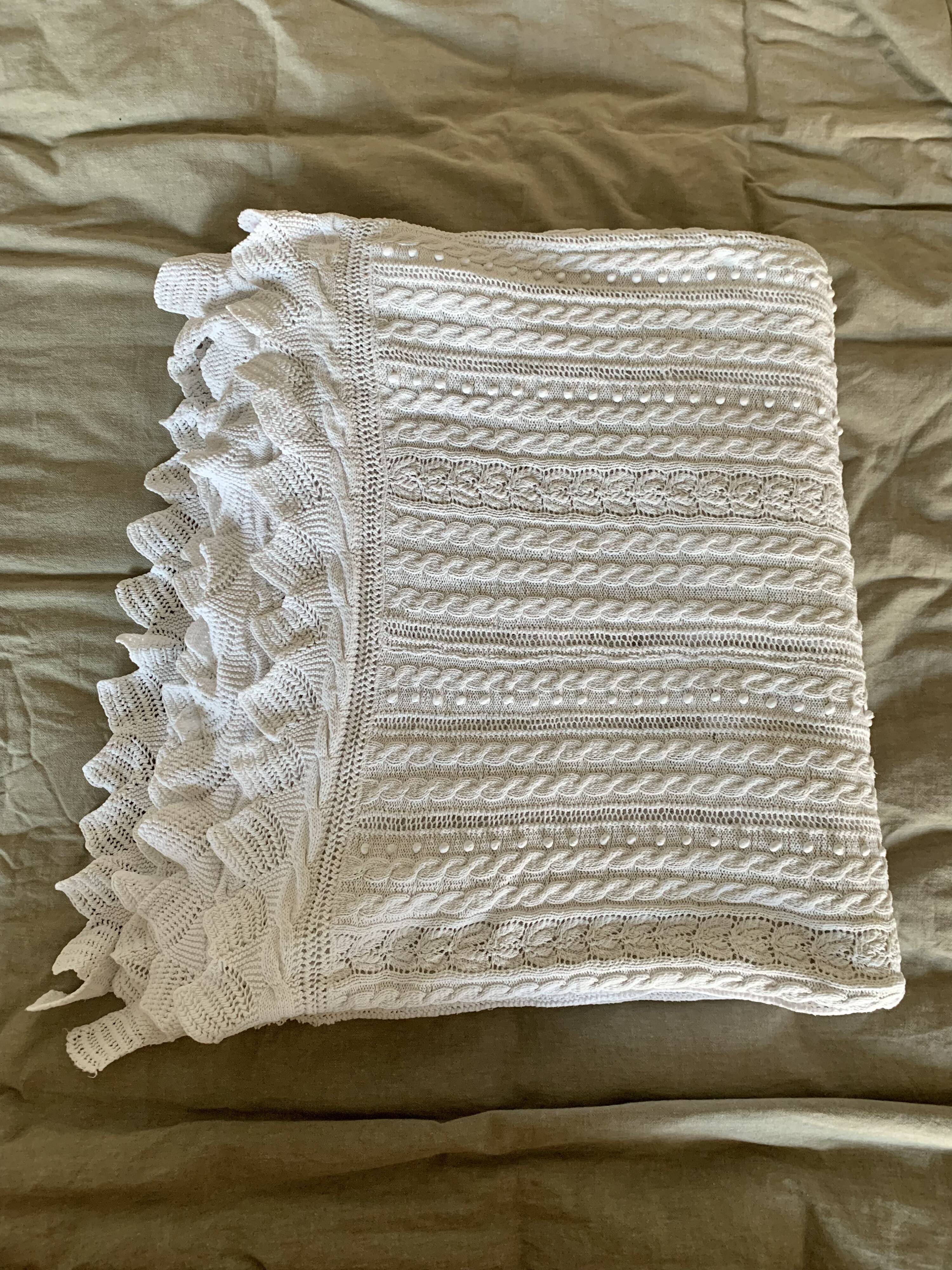 Old knitted cotton bed cover