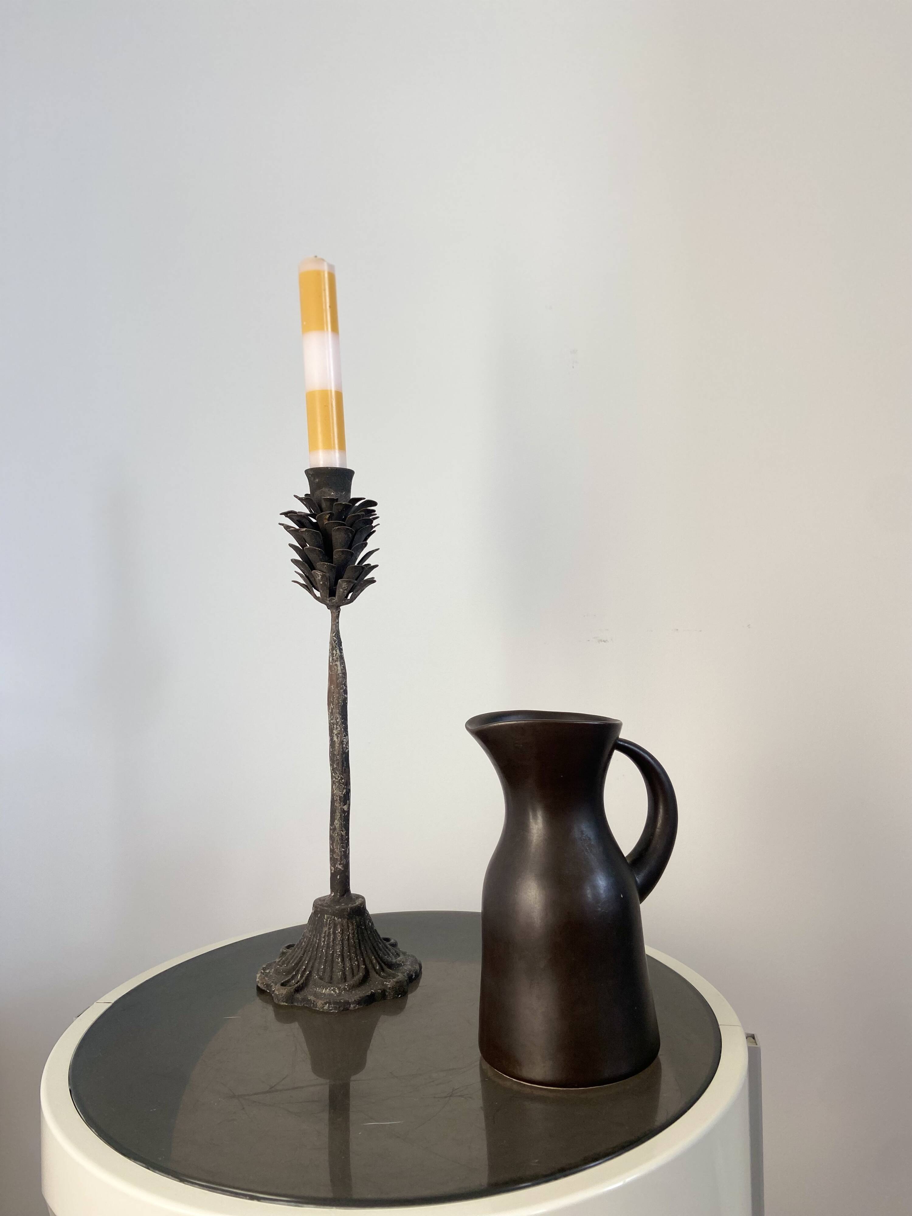 Metal pine cone candle holder