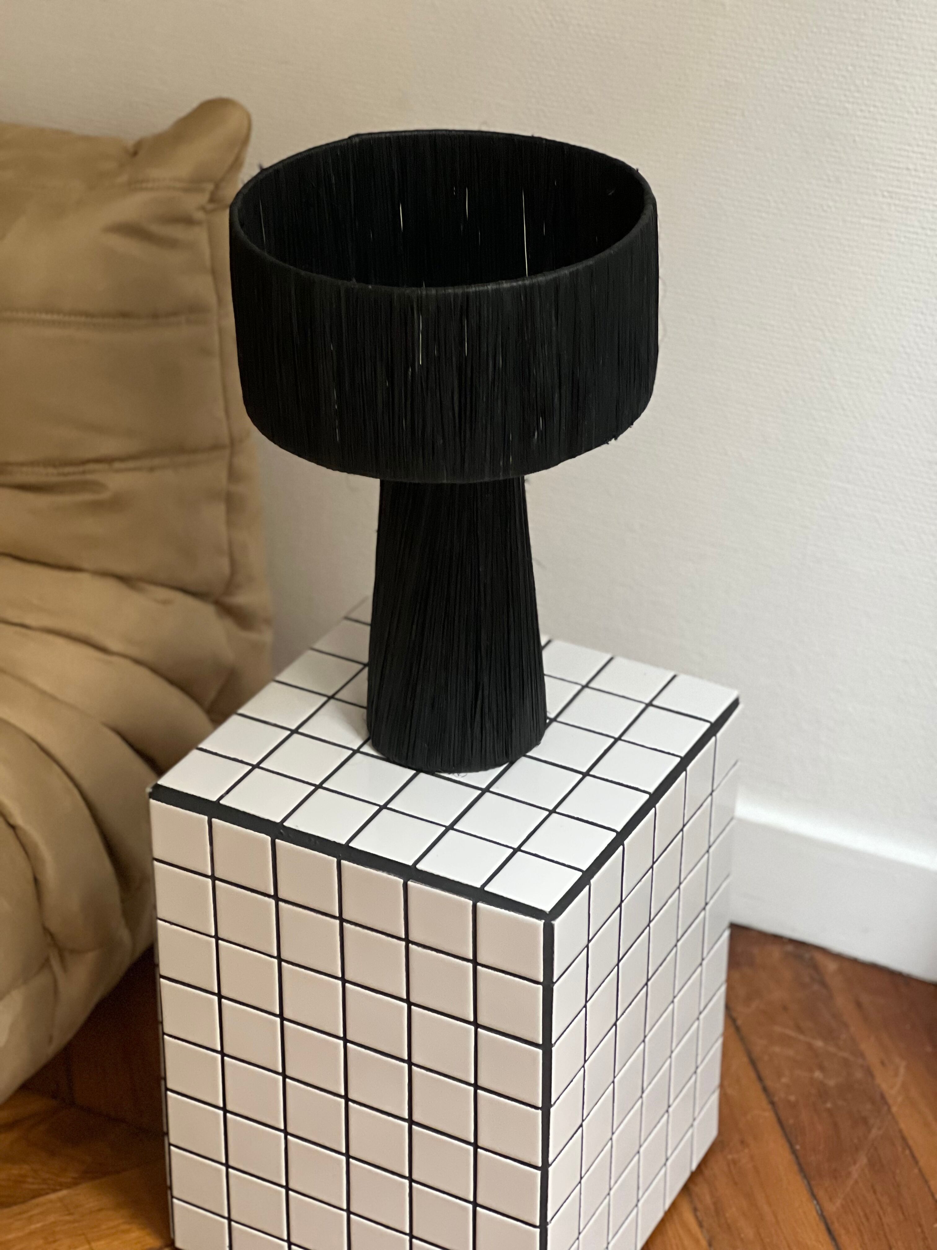 Minimalist black raffia bedside lamp