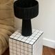 Minimalist black raffia bedside lamp