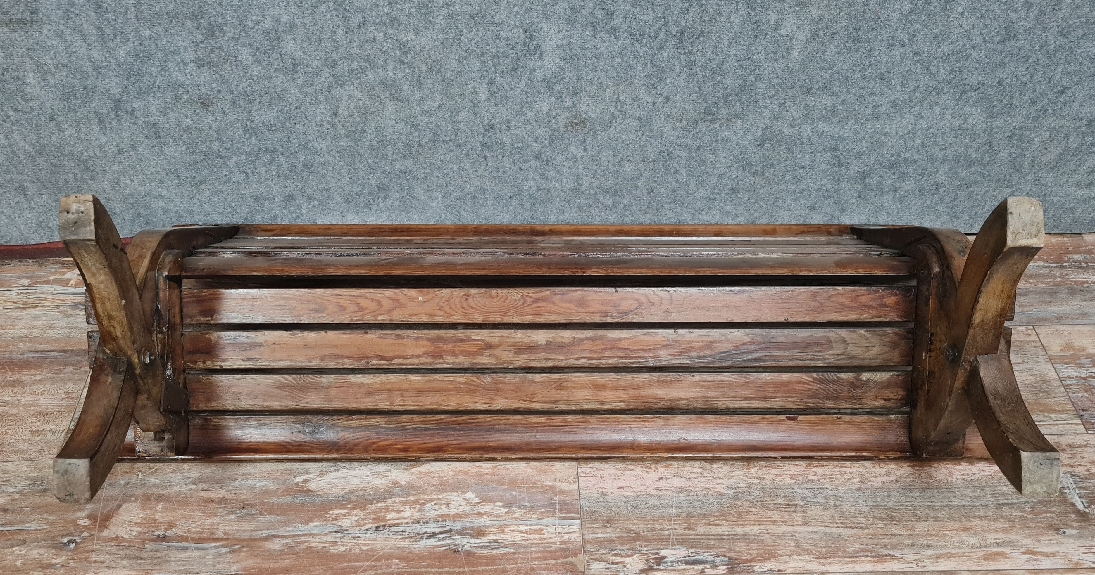 Park bench and garden with natural wood backrest xixth century