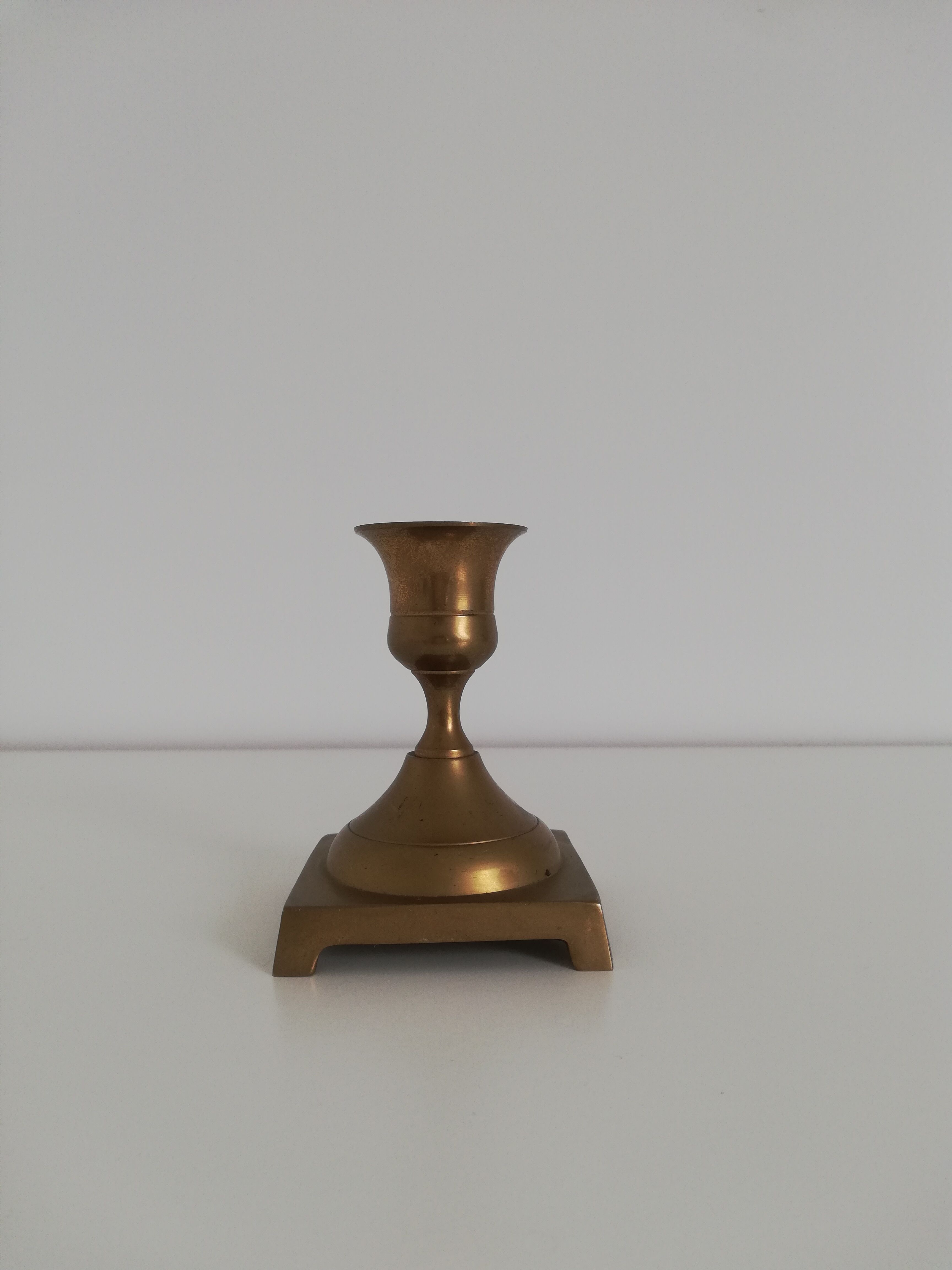 Vintage brass candle holder square base