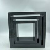 3 nesting shelves in grey lacquer.