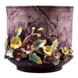 Slip planter with floral decoration