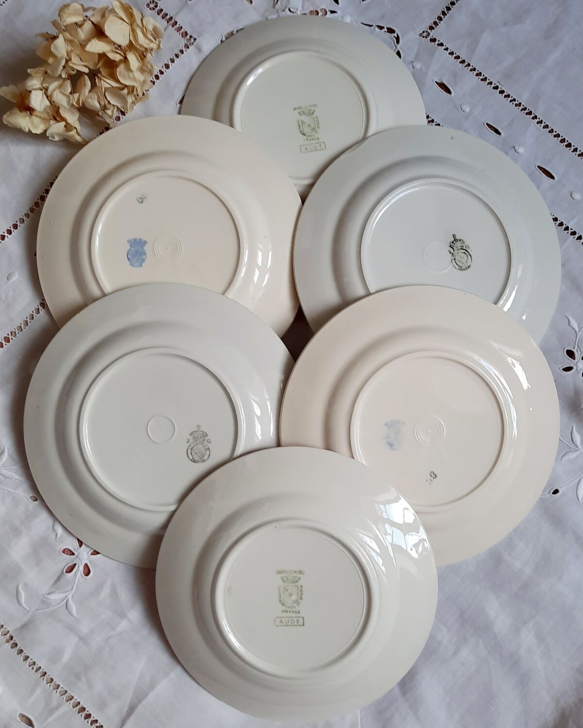 Old mismatched earthenware dessert plates