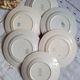 Old mismatched earthenware dessert plates