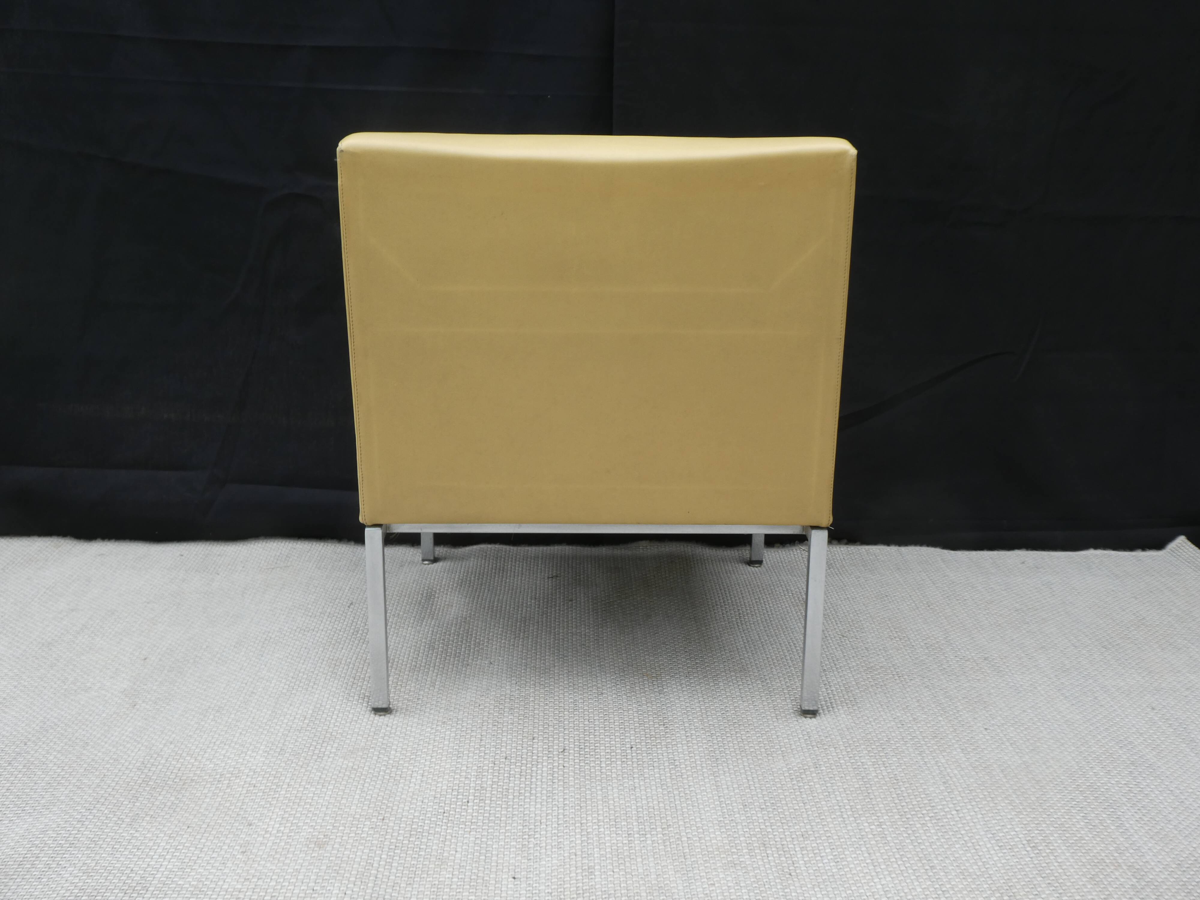Low chair in Skai and chrome, Mobilier International
