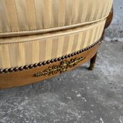 DeCoene antique wood writing desk with beige striped upholstered chair, brass-accented classic set