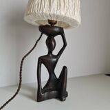 Ebony lamp with seated woman / 1930s