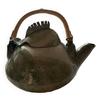 Handmade ceramic teapot with green fish and bamboo