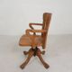 Oak office chair with adjustable spring system and height adjustment, 1950s.