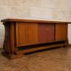 Important Art Deco sideboard in walnut and leather.