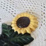 Petite patère vintage tournesol en fonte