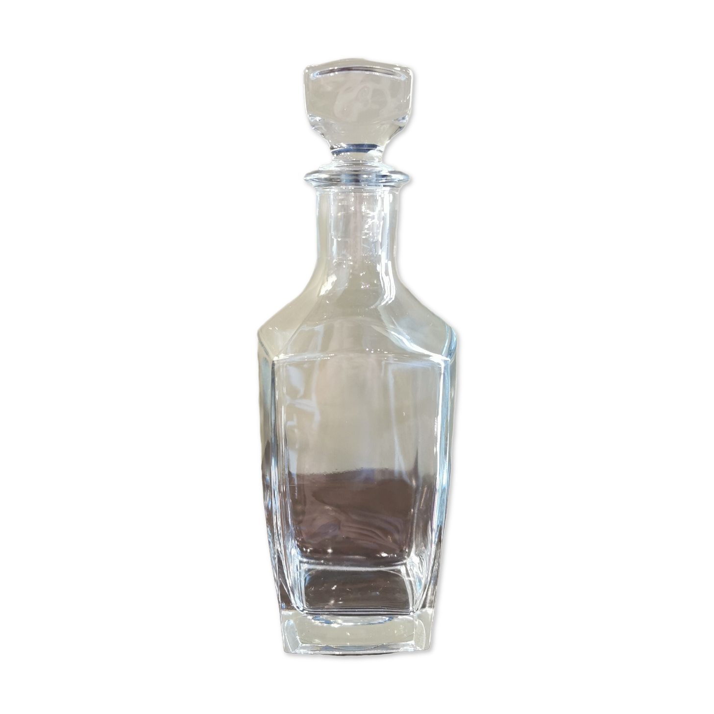 Square vintage decanter made of transparent glass