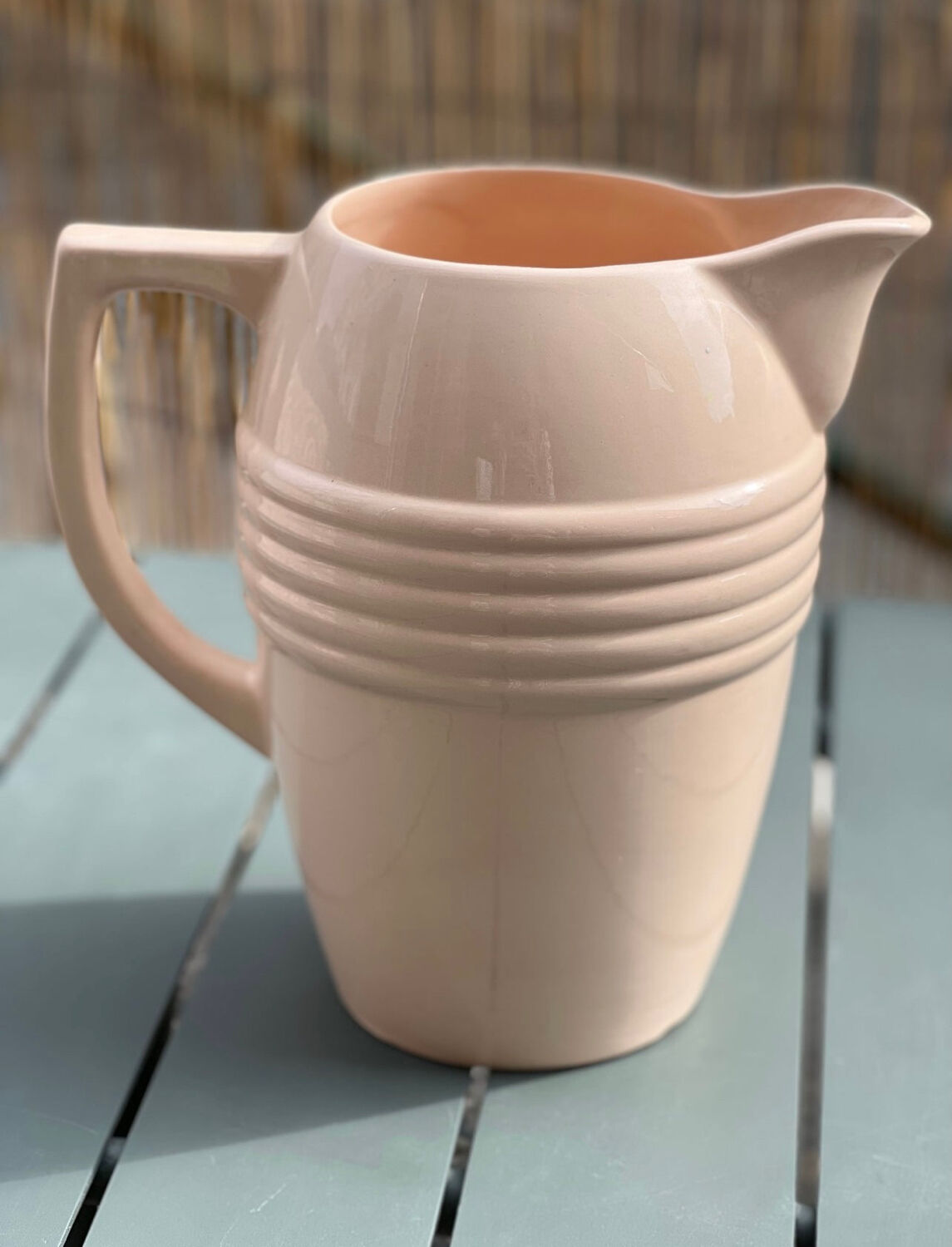 Very large pitcher / vase in powder pink earthenware