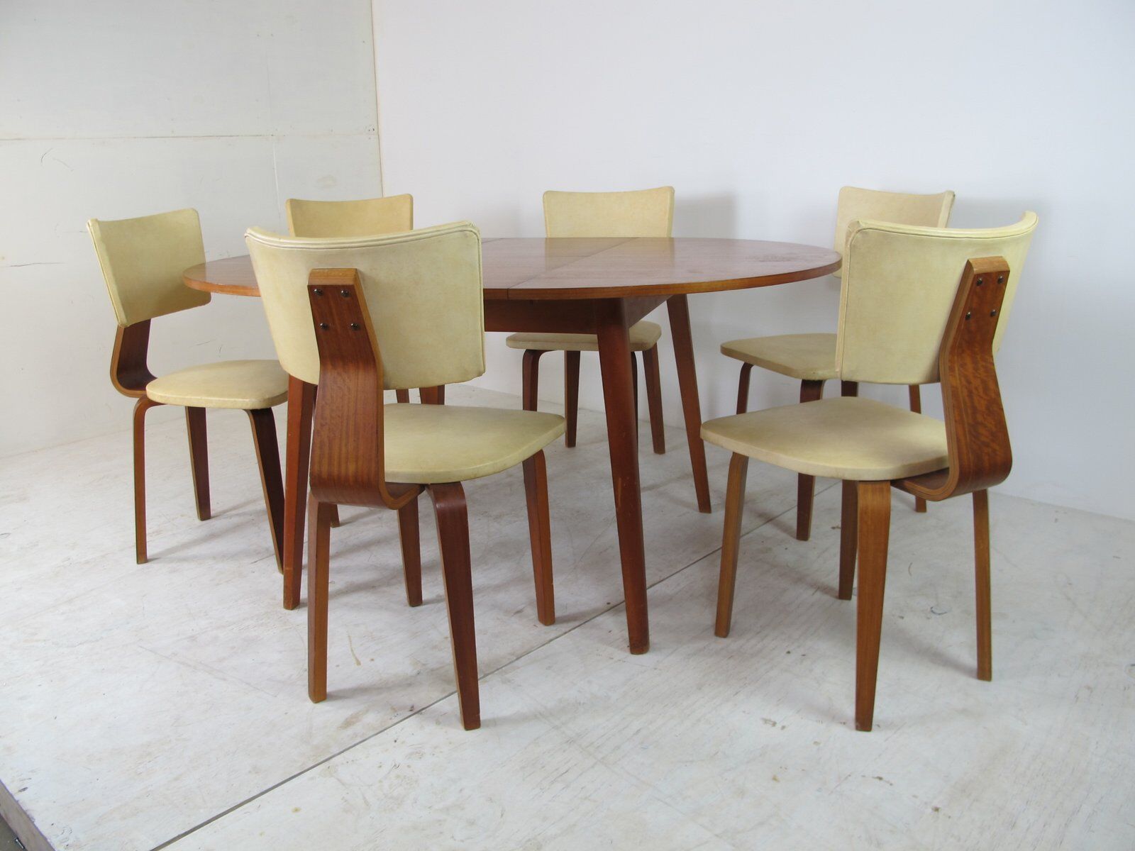 Set of 6 mid-century modernist lounge chairs in plywood - extension table by Cor Alons for Gouda den Boer