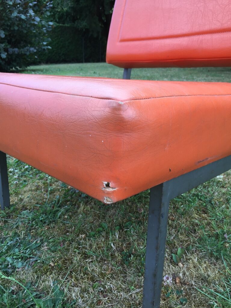 Henri Julien 70s orange chair