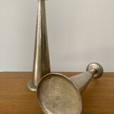 Pair of hammered metal candlesticks
