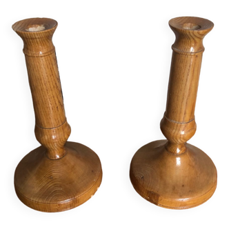 Old pair of vintage turned wood candlesticks