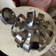 Suspension chrome metal flower