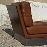2 armchairs and 1 ottoman in brushed aluminium and brown leather, France 1970
