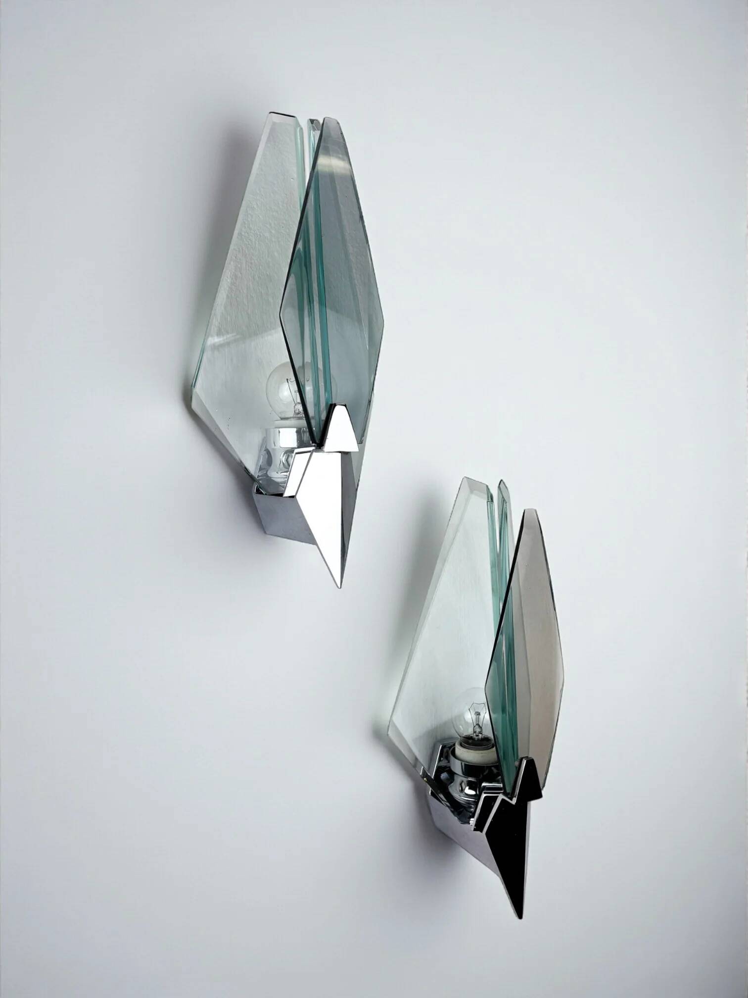 Pair of Veca sconces, Murano blue cut glass & black lucite, Italy, circa 1970s