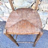 Chaise haute paillée de bar
