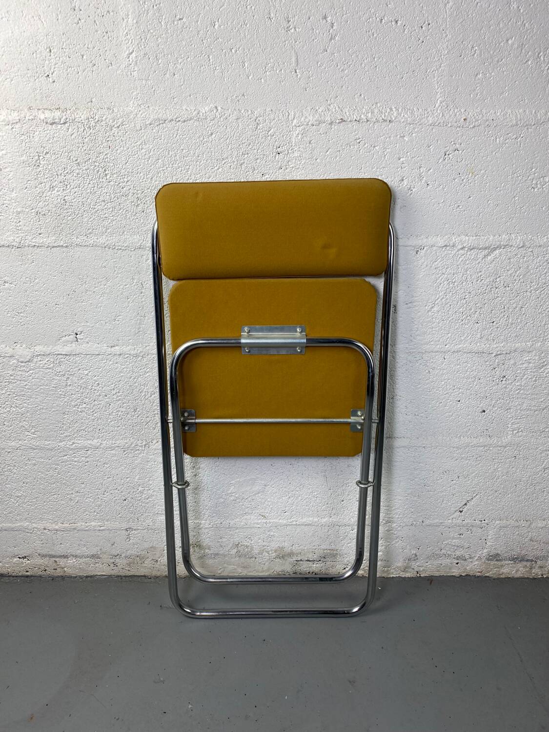 Mustard yellow folding chair