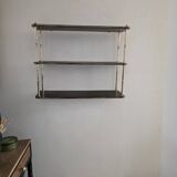 Wooden shelf with gold metal