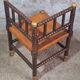 Fireplace corner chair in Louis XIII style, turned wood with braided rush, 19th century.
