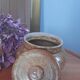 Old salt pot in sandstone, with lid