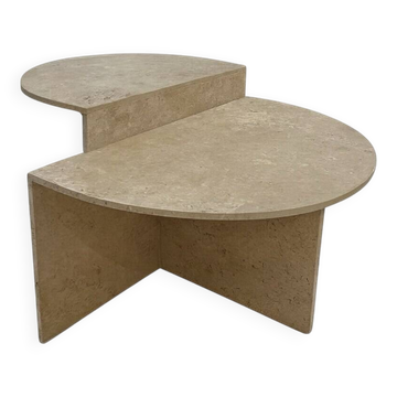 Half-moon travertine coffee table