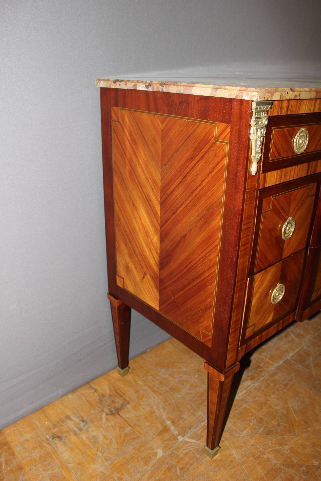 Louis XVI style commode in marquetry from around 1940.