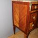 Louis XVI style commode in marquetry from around 1940.