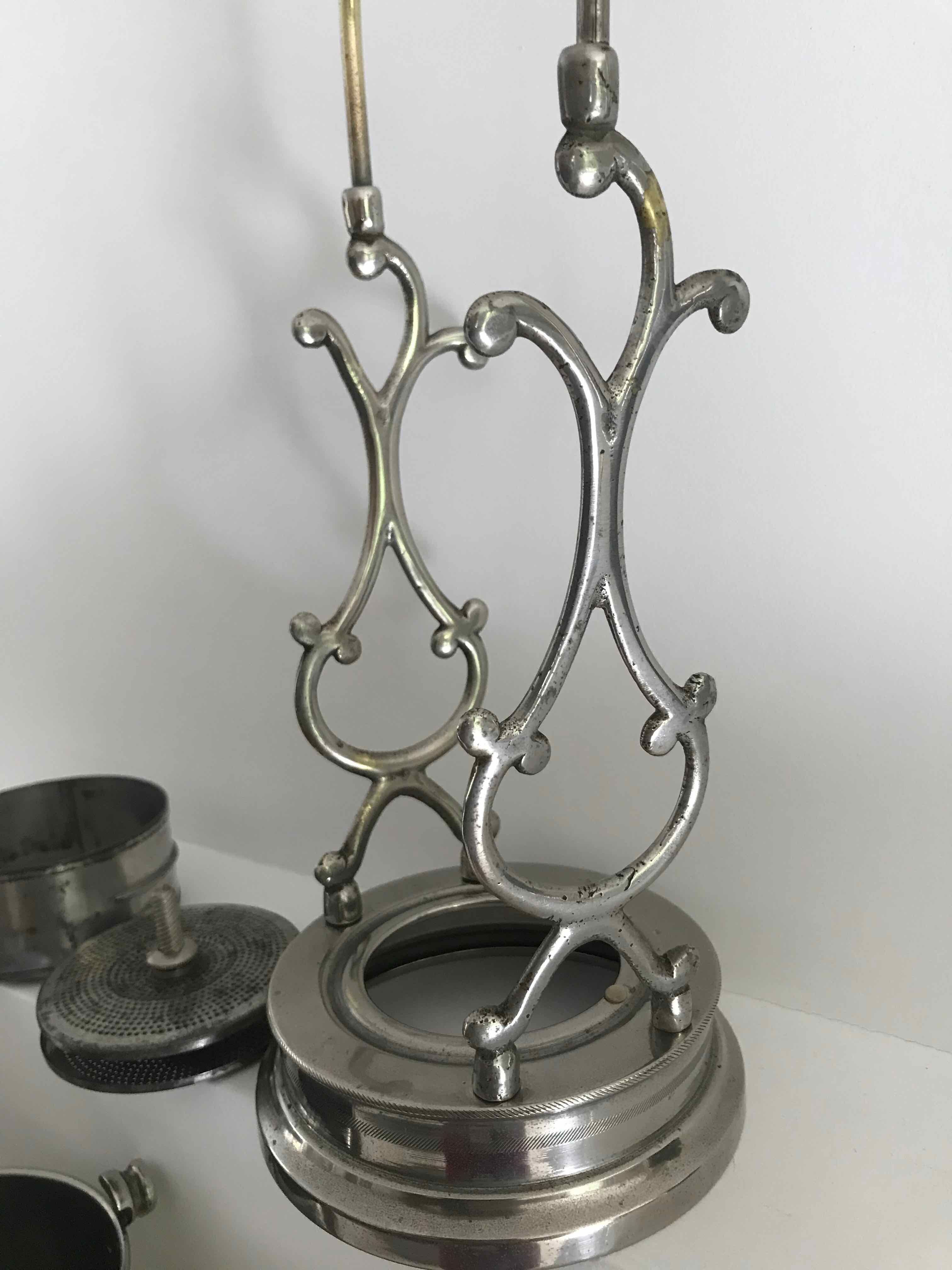 Ancienne cafetière à renversement en métal argenté