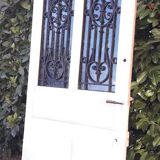 Porte d’entrée ancienne en chêne vitrée grilles en fonte 1925