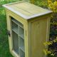 Former toilet cabinet screened door