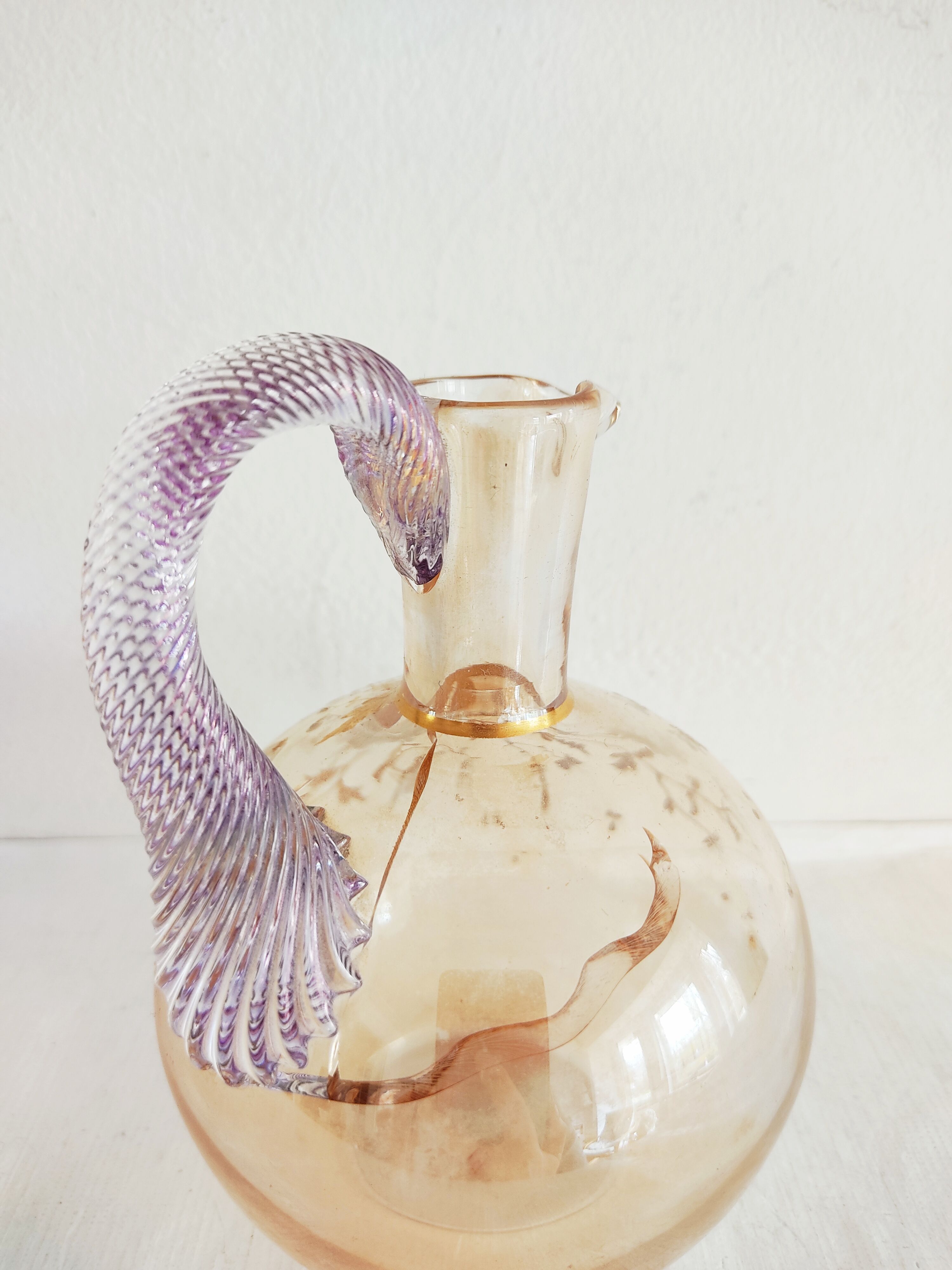 Glass pitcher decorated with 19th century flowers