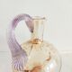 Glass pitcher decorated with 19th century flowers