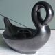Zoomorphic swan candlestick in black glazed ceramic, Italy circa 1950.