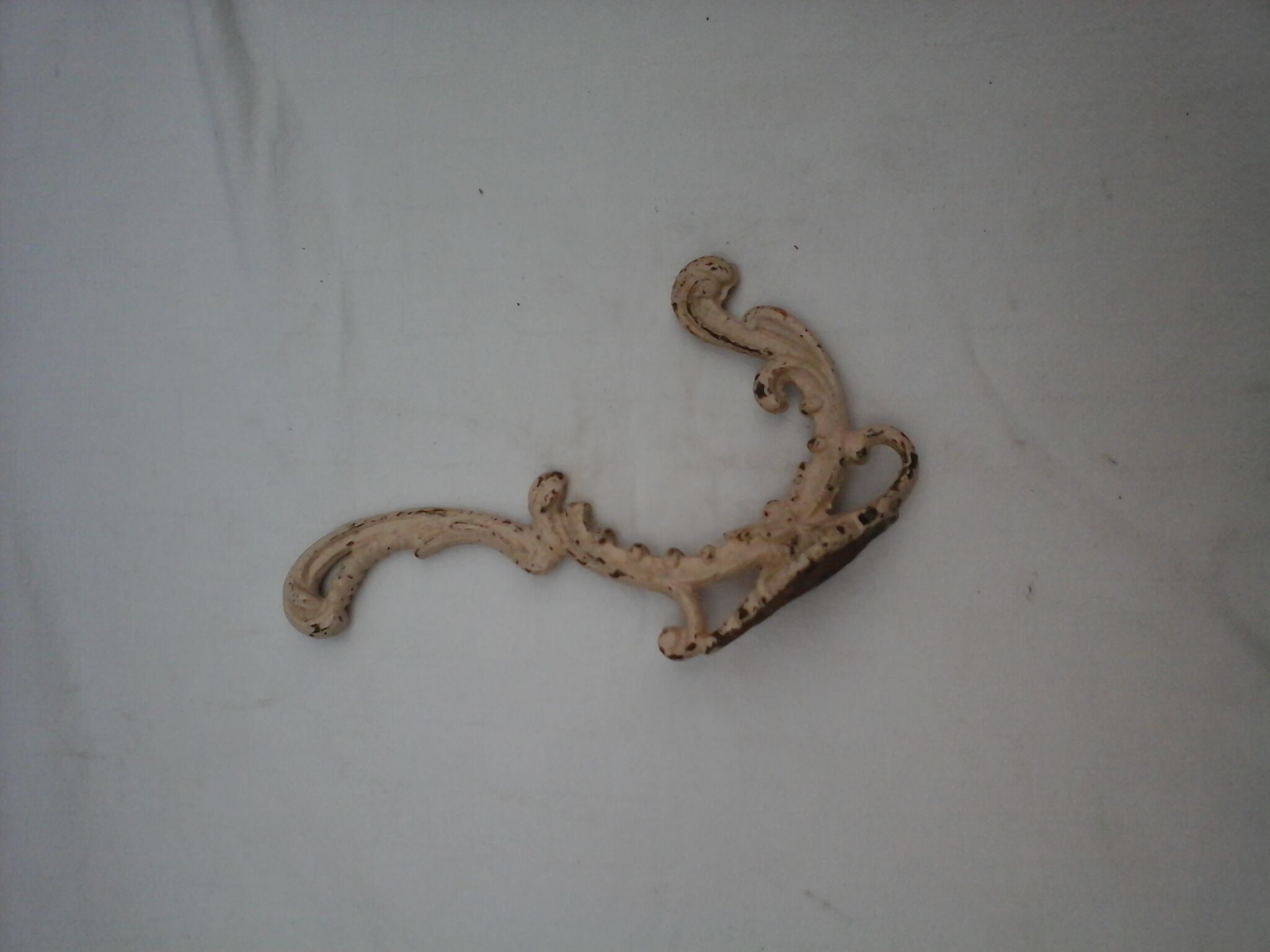 Chiseled cast iron patère