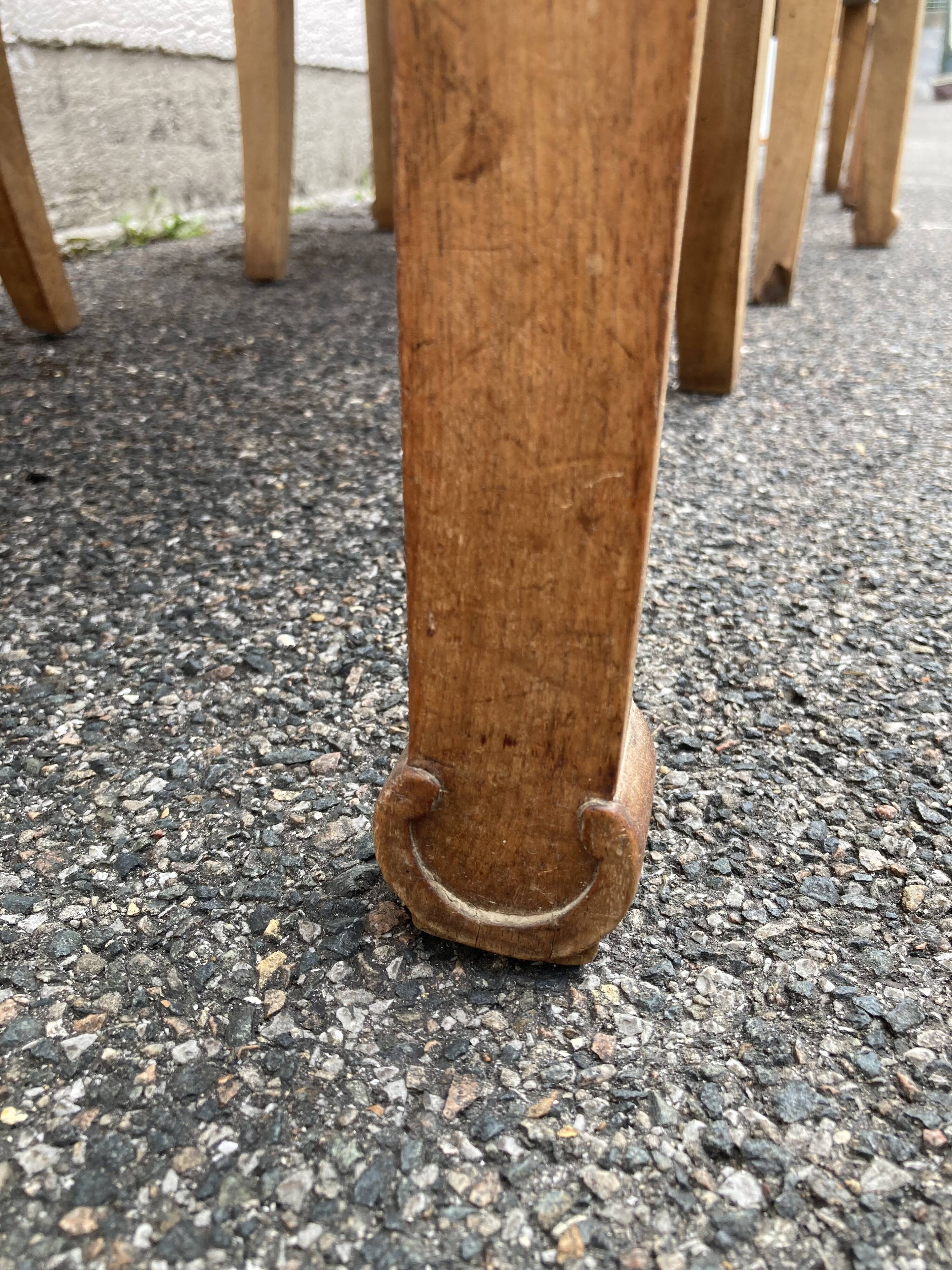 Set of four reupholstered Directoire period armchairs.