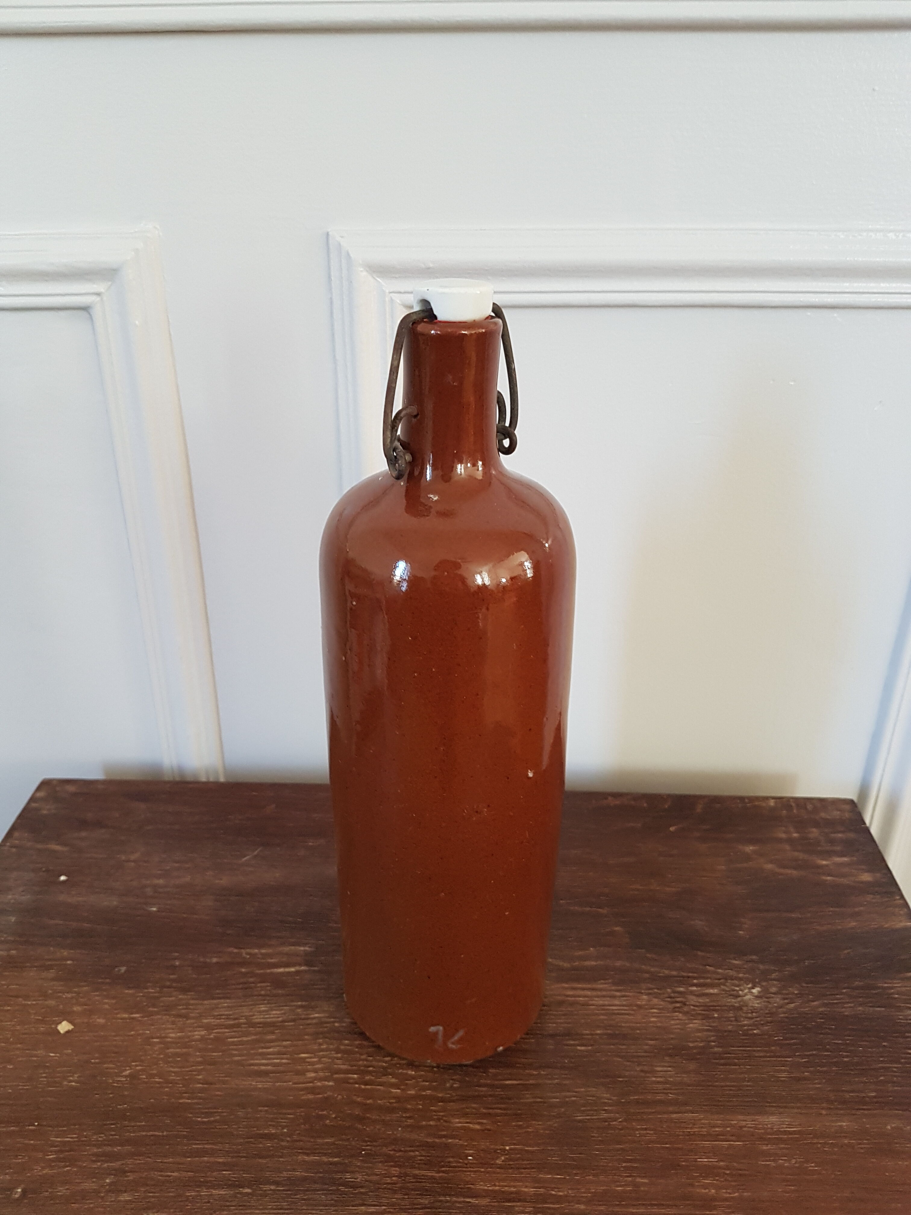 Enamelled stoneware bottle